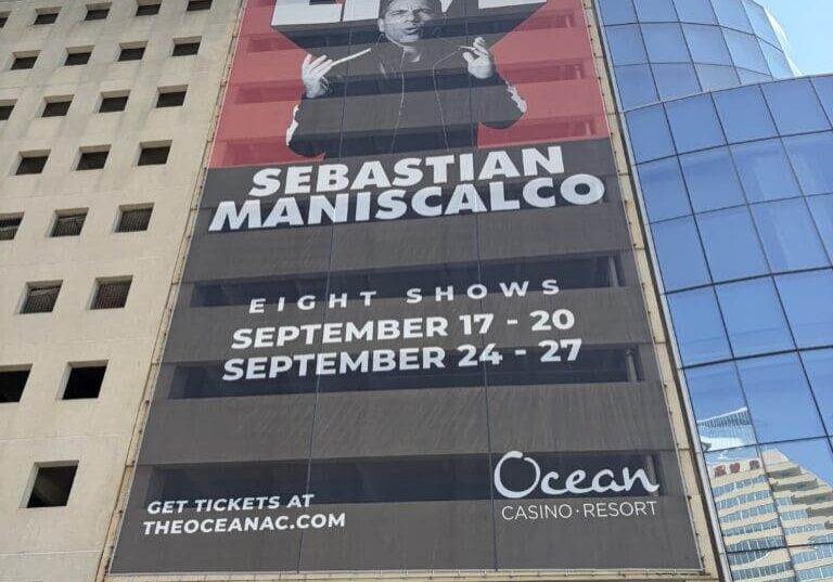 Large comedian live show billboard on building