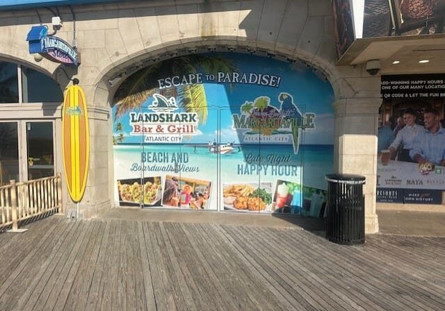 Beach-themed bar and grill entrance signage.