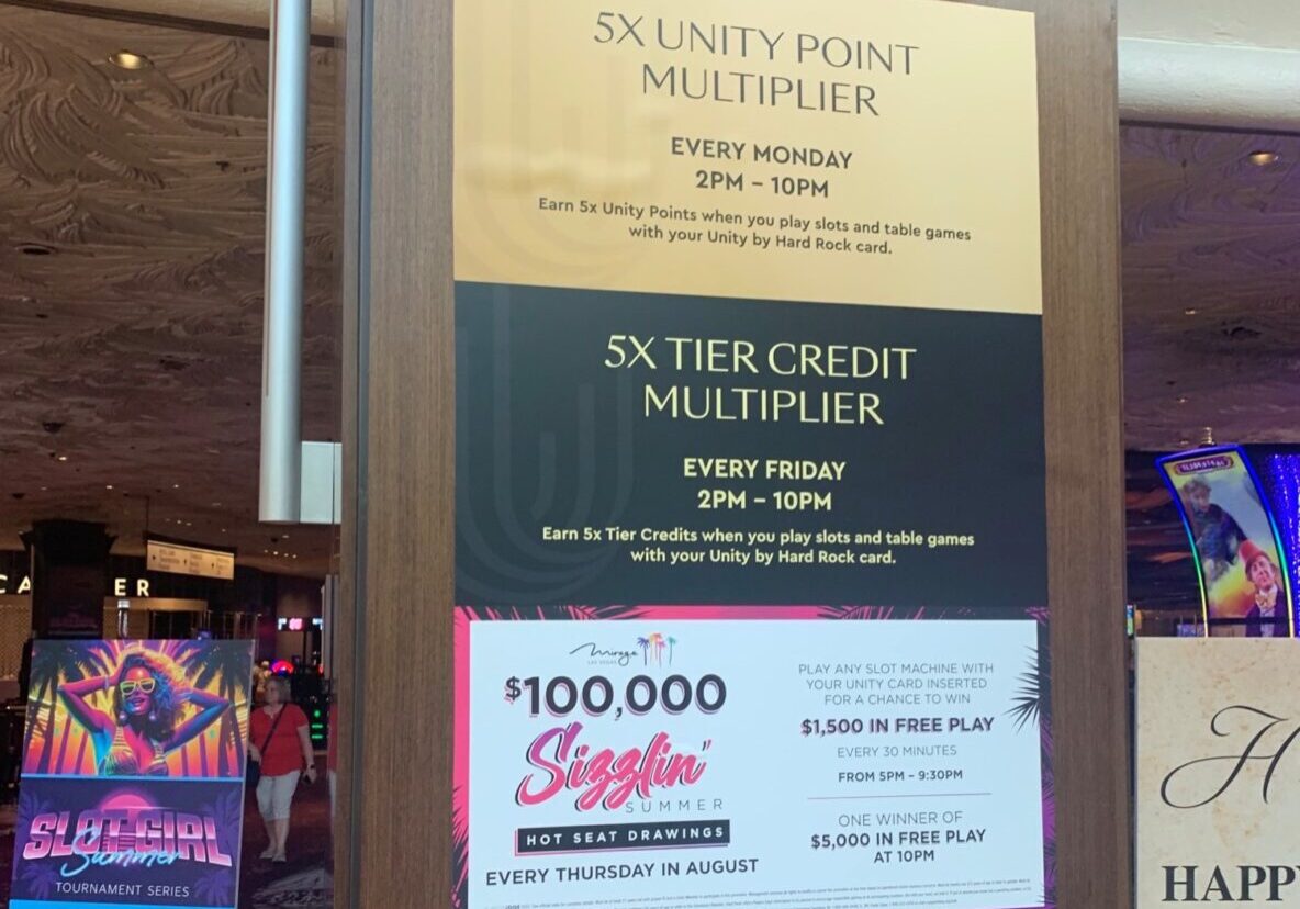 Sign advertising a $100,000 single ticket promotion at a casino.